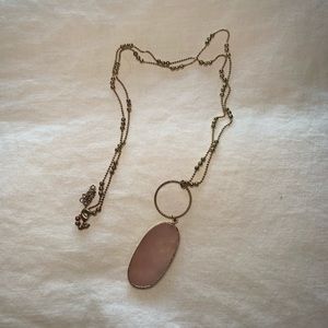 Rose and a Gold necklace